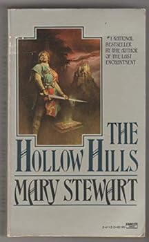 Paperback The Hollow Hills Book
