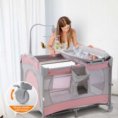 Image of Soobaby 5 in 1 Baby Crib,Bedside Sleeper,Bassinet,Pack and Play with Bassinet and Changing Table,Portable Travel Playpen Music Box,Portable Travel Crib for Infant Newborn (Pink Gray)