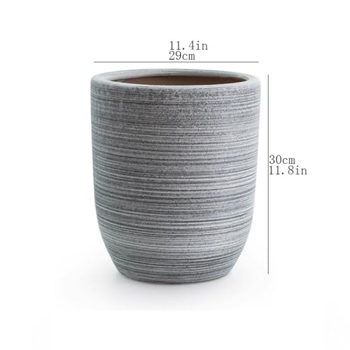 Pot de fleur en céramique grise avec drainage pour plantes d'intérieur