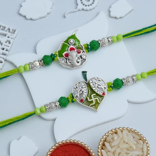 Image of eCraftIndia Leaf Swastika Lord Ganesha Designer Rakhi Set of 2 | Rakhi for Brother Bhaiya Bhai with Best Bro Ever Fridge Magnet | Roli Chawal Pack