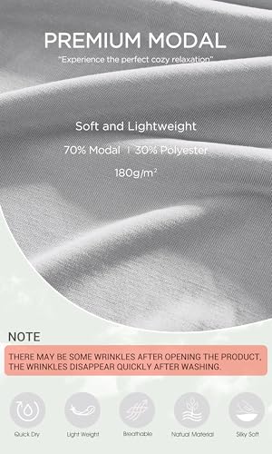 Image of ODODOS Soft Modal Long Sleeve Crop Top for Women with Thumb Hole Athletic Gym Workout Cropped Yoga Shirts