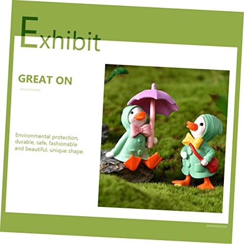 BCOATH 8 Pçs Capa De Chuva Patinho Recipiente De Plástico Mini Brinquedo Topper De Mesa Estátuas De