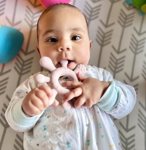 Image of Mostara Star Shape Rudder Baby Teether Ring for 6+ Months. Non-Toxic BPA Free Food Grade Silicone, Baby Tested for Easy Grip and Soothing Teething Pain (Ivory)