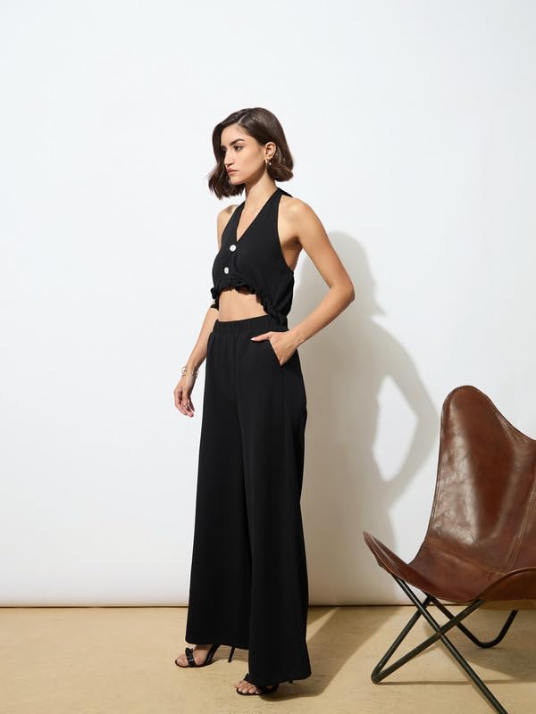 Image of barcino Black Knitted Halter Neck Cut-Out Jumpsuit