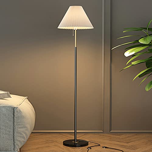 Lámpara de pie minimalista de metal para iluminar esquinas en salas de estar