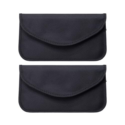 Two black Faraday bags for phones, designed to block signals and protect devices, featured in a review of high-tech travel accessories for 2025.