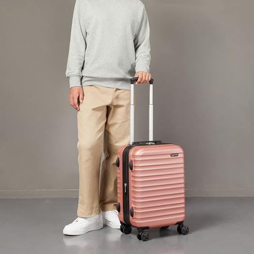 Amazon Basics Erweiterbarer Hartschalen-Kabinenkoffer – ABS-Reisegepäck mit 4 Spinner-Doppelrollen – Kratzfeste und leichte Konstruktion – 37,5cm x 25,5cm x 55,0cm – Roségold