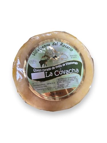 Queso curado de Oveja Artesano La Covacha, envuelto en Aceite de Oliva: Una joya gastronómica que captura la esencia de la Sierra de Grazalema. Descubre un sabor auténtico en cada bocado.(2KG APROX)