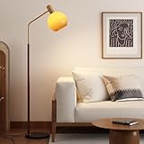 Look nordique avec abat-jour globe en verre : Avec ses lignes métalliques épurées et son abat-jour globe en verre, ce lampadaire apporte un charme nordique moderne à tout décor. Le verre dépoli diffuse doucement la lumière, réduisant l'éblouissement et la fatigue oculaire, tout en créant une atmosphère chaleureuse et accueillante.