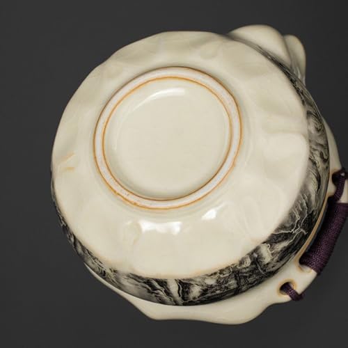 Tetera para el hogar de gran capacidad que evita quemaduras al servir el té 6