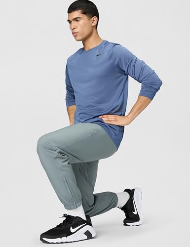 Image of Nike Men's Form Dri-FIT Tapered Versatile Pants