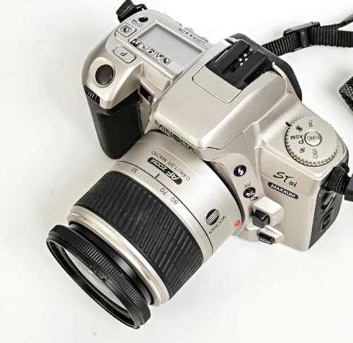MINOLTA Maxxum StSi 35MM SLR film camera with Minolta MD Auto focusing Mount Lens system and Built-in flash. Included AF/MF lens. (Renewed)