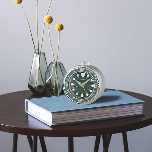 Image of Seiko Silver Portable Alarm Clock with Rotating Bezel, Quiet Sweep Second Hand & Snooze Function (Model: QHE207A | Size: 10.4 x 9.7 x 5.5 cm | Weight: 131 g)