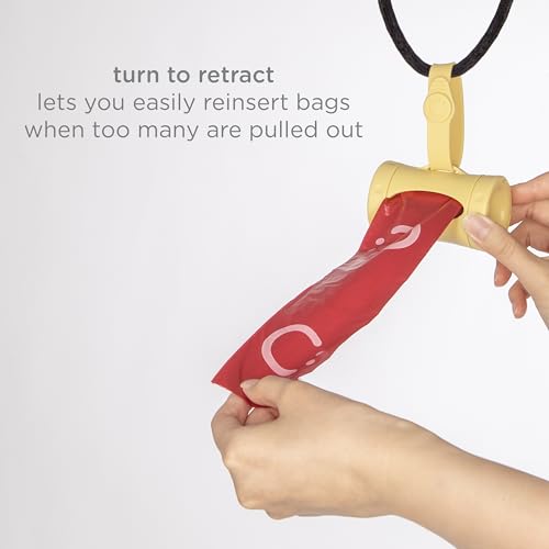 Image of Ubbi Retractable Dog Poop Bag Holder and Dispenser with Silicone Strap Leash Attachment, Includes 2 Rolls of Lavender Scented Leakproof Waste Bags, Yellow