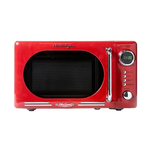 Nostalgia Retro Compact Countertop Microwave Oven, 0.7 Cu. Ft. 700-Watts with LED Digital Display, Child Lock, Easy Clean Interior, Red