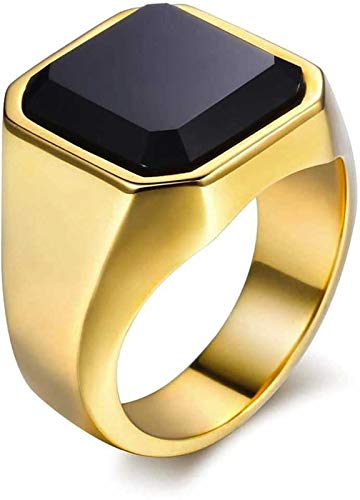 gold ring with black stone