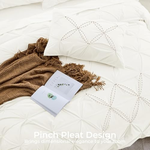 Image of Sasttie King Size Comforter Set, 7-Piece Bed in a Bag, Pintuck Bedding Set for All Season, Includes Comforter, Flat Sheet, Fitted Sheet, Pillowcases and Pillowshams, Ivory