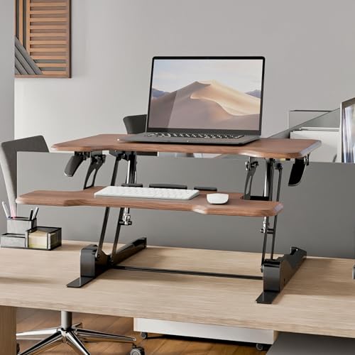 Image of Mount-It! Height Adjustable Standing Desk Converter, Compact 30 inch Wide Tabletop Standing Desk Riser with Gas Spring, Desktop Stand Up Workstation with Keyboard Tray Fits Monitor or Laptop, Dark Walnut