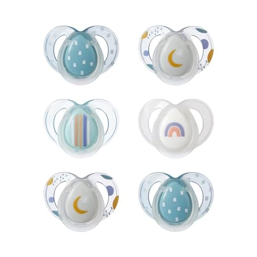 Tommee Tippee Night Time Pacifier, 6-18 Months, Symmetrical Silicone Baglet, BPA-Free Binkies, Glow in The Dark Technology, Blue Rainbow, Pack of 6