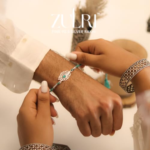 Image of 92.5 Sterling Silver Peacock Feather with Stone Thread Rakhi For Rakshabandhan | Rakhi With Fragrance Greeting Card & Roli Chawal and Silver Certificate of Authenticity