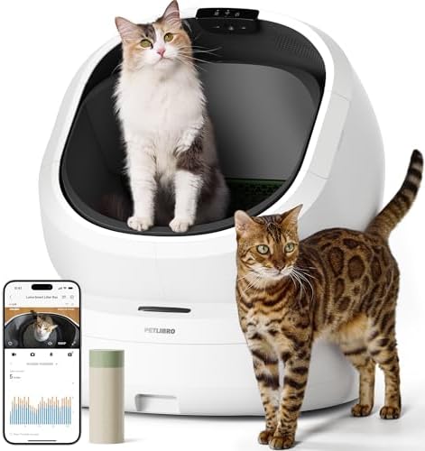 Photo of a white cat using the PETLIBRO Luma automatic self-cleaning litter box in a modern home setting