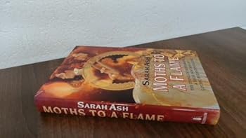 Hardcover Moths to a Flame Book