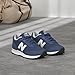 New Balance Women's 515 V3 Sneaker, Nb Navy/White/Aluminum Grey, 9