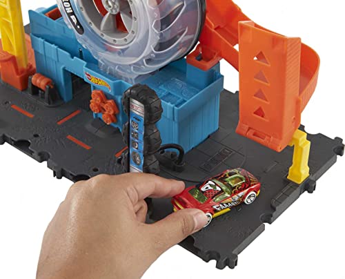Hot Wheels City Super Twist Tire Shop - Taller con Rueda Gigante - Incluye Coche - Compatible con Conjuntos Hot Wheels - Regalo para Niños de 4-8 Años, HDP02