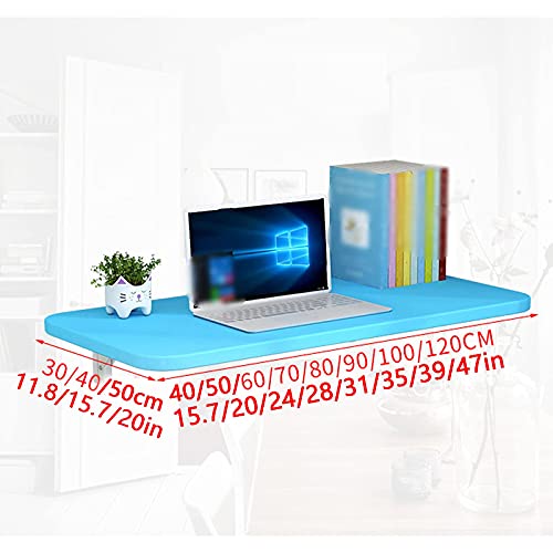 Table murale pliante pour optimiser un studio étroit sans encombrer le sol