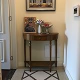 Des tiroirs pratiques pour un rangement organisé : Dotée de tiroirs pratiques, elle permet de ranger facilement clés, télécommandes et objets du quotidien, libérant ainsi le plan de travail et ajoutant fonctionnalité et praticité à la console demi-lune en bois.