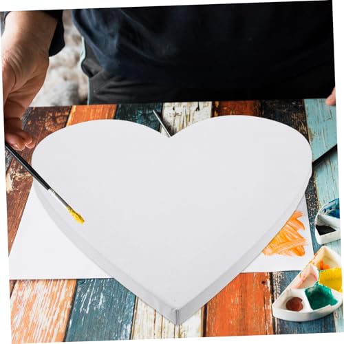 Lienzo blanco en forma de corazón con base de madera y grano de lino 7