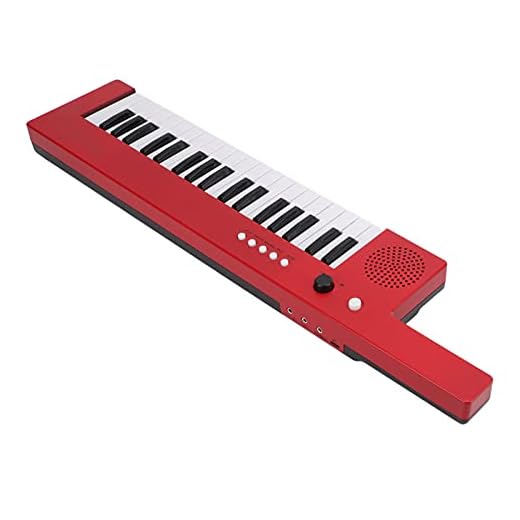 Piano de 37 Teclas con Micrófono, Delgado Y Súper Compacto Guitarra Portátil Órgano Electrónico Mini Keytar Instrumento Musical de Educación para Principiantes(BF-3755 rojo)