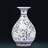 Ce vase antique de style chinois présente des motifs floraux complexes et une forme classique intemporelle, parfait pour ajouter une touche de charme vintage à n'importe quelle pièce