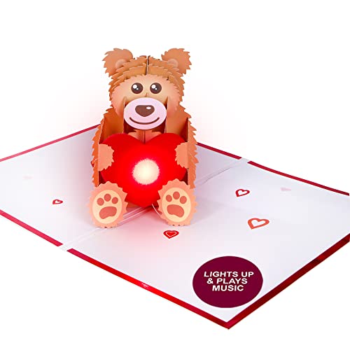 100 Greetings LIGHTS & MUSIC Teddy Bear Valentines Card â€“ Plays Song STILL THE ONE â€“ Valentines Day Gifts for Him & Her â€“ Valentines Day Cards for Him & Her â€“ Happy Valentines Day Card for Him & Her