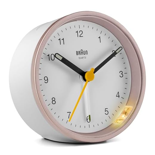 Braun Classic Analogue Clock with Snooze and Light, Quiet Quartz Movement, Crescendo Beep Alarm in White and Rose, Model BC12PW, Pink, One Size