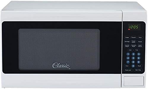 Davant view of the CLASSIC Countertop Microwave Oven with digital display showing 12:05 and control panel on the right.