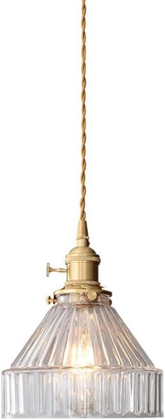 Luminaire suspendu en verre pour remplacer une lampe de chevet encombrante sans travaux
