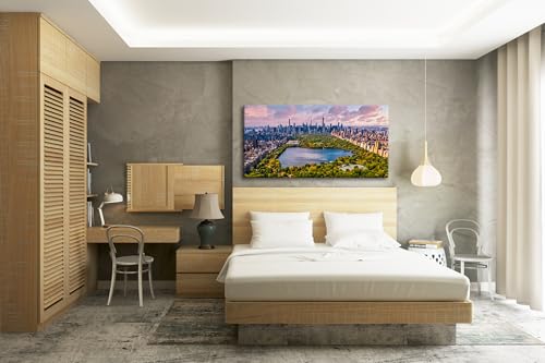 Ein Blick über den Central Park, eingebettet in die mächtige Skyline von New York, bei strahlendem Himmel. Panorama 80x40 cm als Leinwandbild, Motiv gerahmt auf Echtholzrahmen,Digitaldruck