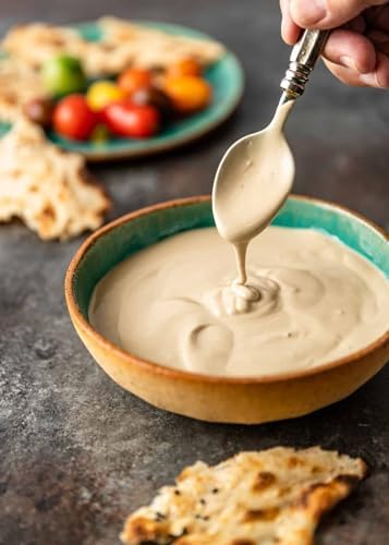 Image of Al Marah White Tahini /Tahina Paste, 250g ( 100% Hummus Ground Hulled Sesame Seed Paste Smooth & Creamy, Natural For Hummus, Middle Eastern Condiment for Salad Dressings, Gluten Free, Keto Friendly, Baba Ghanoush and More )