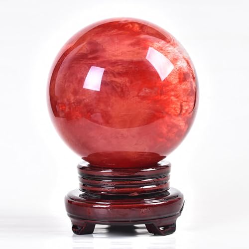 Boule de cristal rouge pour casser la monotonie d'un meuble de salon terne