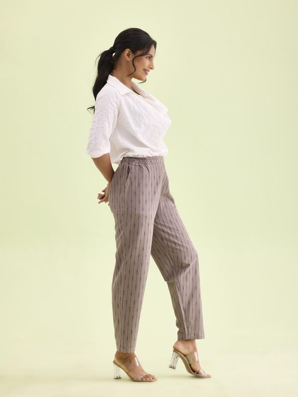 Image of GO COLORS Ikat Print Beige Printed Pencil Pant for Women | Breathable, Side Pocket