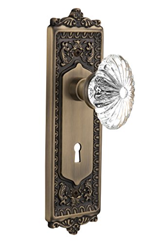Nostalgic Warehouse Egg & Dart Plate with Keyhole Oval Fluted Crystal Glass Knob, Single Dummy, Antique Brass