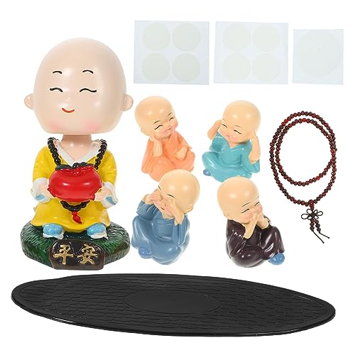 Petite statue de moine pour apaiser le tableau de bord de voiture