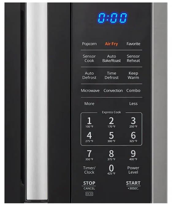Close-up of the Vissani microwave oven control panel with various buttons and digital display