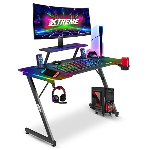 XTREME by O&S Carbon Fibre Effect Compact Z Frame RGB PC Computer Gaming Desk with RGB LED Lights Monitor Screen Stand, Desktop Tower Stand Trolley, Cable Management & Drinks Holder 120cm x 60cm Black