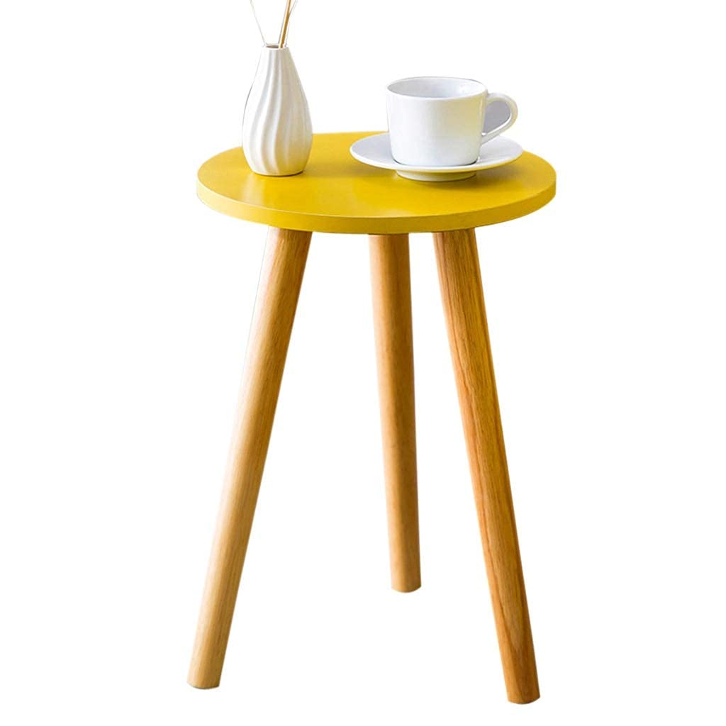 Table basse gain de place jaune en bois pour aménager un petit salon