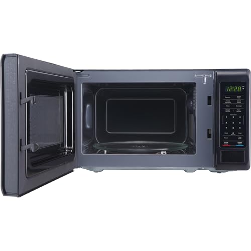 Image of Magic Chef 0.7 cu. ft. Countertop Microwave in Black - 700W (10.1 inchH x 17 inchW x 12.5 inchD) MC77MB