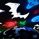 Idena 50148 - LED Projektor Halloween, leuchtet mit bunten Halloweenmotiven, LED Sternenhimmel Projektor mit 2 Modi, für Innen, batteriebetrieben, ca. 16,2 x 13 cm