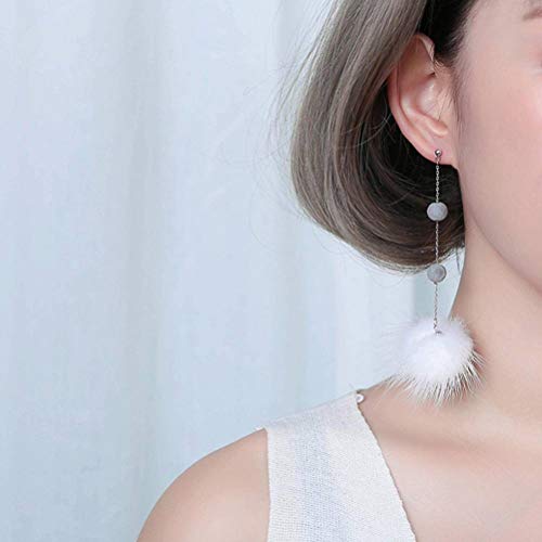Grandes boucles d'oreilles tempérament féminin avec pompon haut de gamme