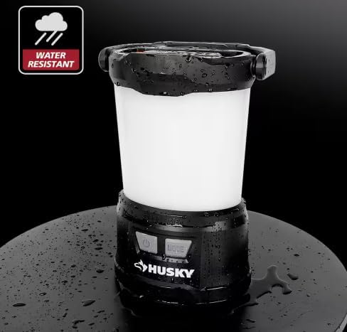 Husky 2200 Lumens Hybrid Power Dimmable Lantern with water droplets, indicating water resistance